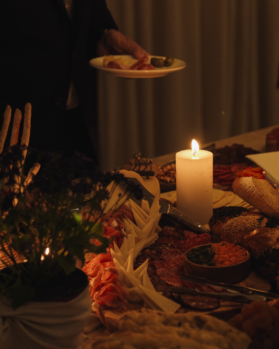 A charcuterie spread lit at dusk at La VidA restaurant, Susana Balbo Winemaker's House